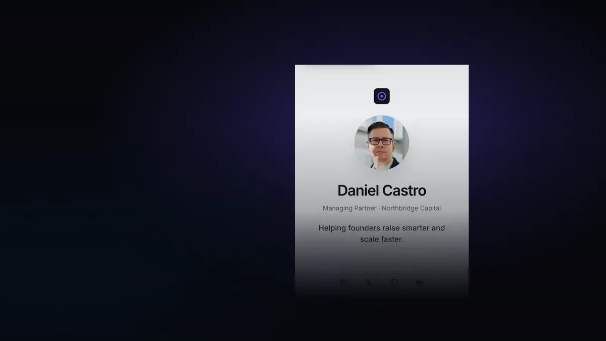 A digital business card lit in a dark room, the first frame of the film